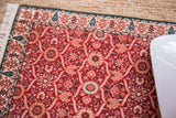 Intricate Mogul style red floral and palmette pattern on Shah Jahan mouse pad.