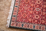 Shah Jahan mouse pad with deep red intricate floral design, decorative border, and fringe.