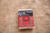 Northwest Persian Rug Coaster Set with vibrant red, blue, green 18th-century medallion design and fringe.