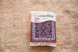 Freud Persian Qashqai Coaster Set with red, blue, ivory geometric design and fringe.