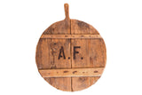 Vintage wooden pizza board with rustic patina, hand-hewn nails, and stamped A.F.