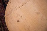 Visible natural wood grain and rustic patina on vintage wooden pizza board.