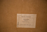Vintage school chart's reverse, showing aged brown backing, German text label, handwritten script.