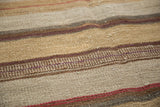 New Kilim Carpet, textured hand-woven stripes in brown, ivory, and muted tones.