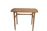 MCM Danish teak end table with warm brown rectangular top and tapered legs.
