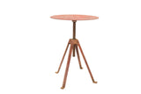 Vintage industrial swivel bistro table, round top, weathered red metal finish.