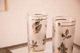 Frosted vintage glassware featuring silver fall leaf pattern and clear rim detail.