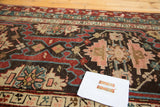 Vintage Caucasian runner's hand-knotted tribal geometric pattern in madder red, teal, and blush rose.