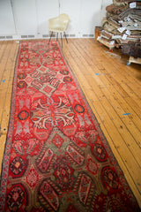 Distressed Karabagh rug with oversized medallions, paisley botehs, blood orange.
