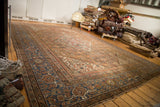 Antique Distressed Mahal Carpet border with faded blue turtle and samovar motifs, Herati field.