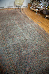Distressed antique Doroksh gallery runner, intricate floral motifs in muted rust and navy.