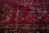 Distressed plum purple field, classic floral bouquet patterns, dark navy and gold border.