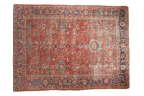 Antique Sultanabad carpet with unique coral-red field, lavender-purple border, distressed, 8'5