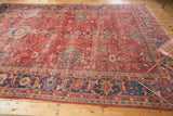 Antique Sultanabad carpet corner: unique lavender-mauve border, coral field, subtle storied wear.