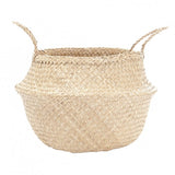 Natural woven seagrass texture and braided handle detail of the belly basket.
