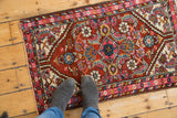 Vintage Persian Hamadan rug with fluorescent blush pink border and bright jewel-toned patterns.