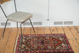 Vintage Persian Hamadan rug's upbeat jewel tones and fluorescent blush pink border.