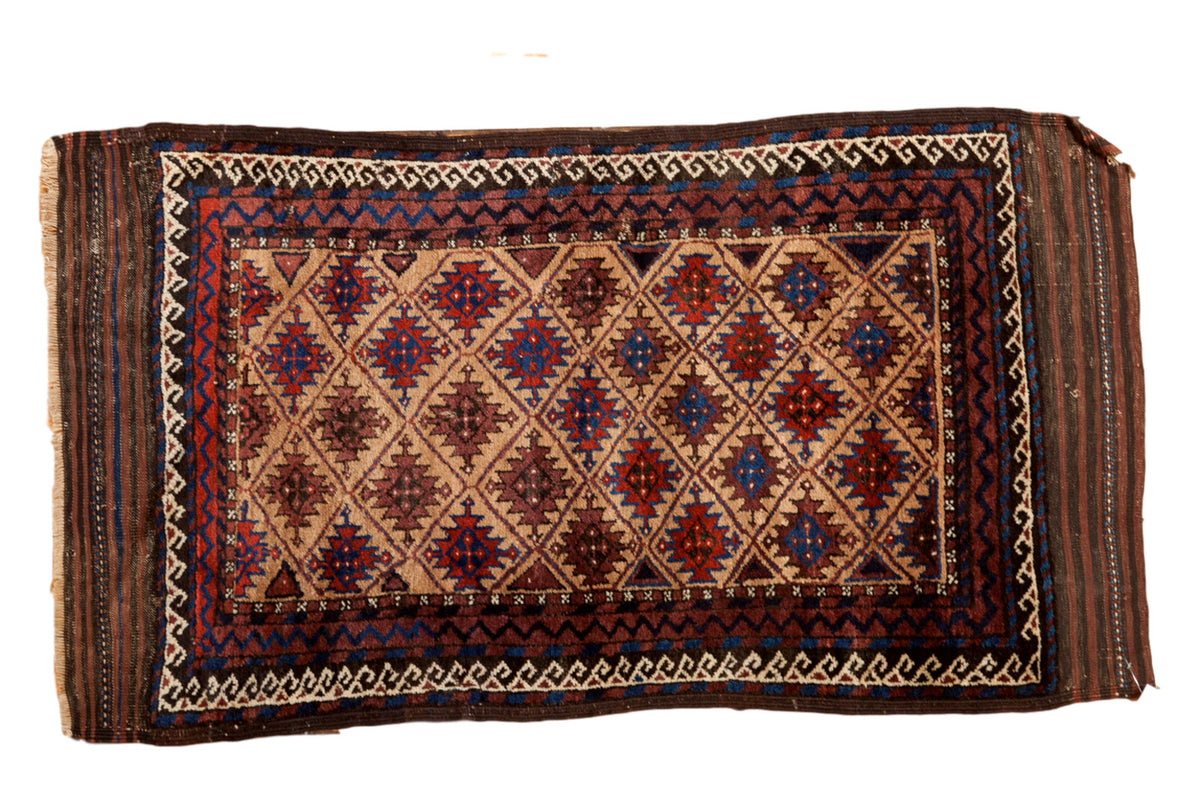 Vintage Belouch rug with natural camel field, serrated guls, and geometric borders, 2'9" x 5'.