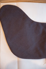 A close-up view of the black linen backing of the holiday stocking.