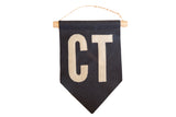 Handmade navy felt pennant flag with cream hand-sewn 'CT' letters, 7