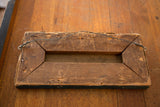Vintage Sea Painting's reverse, featuring weathered wood frame and twisted hanging wire.