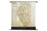 1930s vintage Cram's pull down map of Illinois with colorful counties and railways.