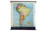 Vintage 1930s Cram's South America map, multi-colored countries against a light blue ocean.