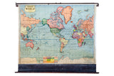 1930s Cram's Superior Series pull down world map in vintage pastel tones.