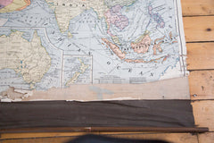 Large vintage 1930s pulldown map of asia, australia, and europe with wooden dowels