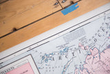 Vintage Cram's map showing Arctic region, 'Editorial Note,' and numerical coordinates.