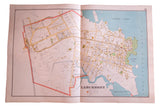 Antique Larchmont map with detailed streets, blue waterways, and coastal land plots.