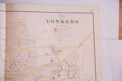Vintage antique paper map of the city of Yonkers NY located south of the Bronx and New York City in Westchester County 