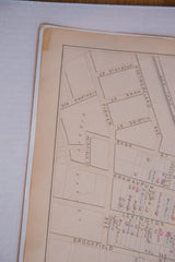 Detailed close-up of an antique White Plains map showing the street grid and aged paper texture.