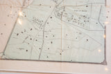 Detail of antique map of Irving, New York, showing streets, buildings, and ornate border.