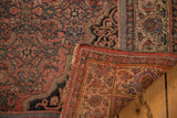 Antique Bijar carpet corner displaying red wool wefting, secured edge, and richer reverse colors.