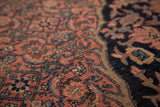 Superb detail in curvilinear patterns on antique Bijar carpet, terra-cotta and charcoal wool pile.