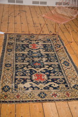 Antique Perpedil Caucasian rug border showing rams horn motifs and aged patina.