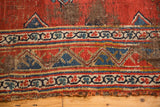 Antique Bijar rug runner's tattered geometric border, with wear down to foundation.