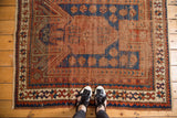 Antique Sewan Caucasian rug, indigo and madder red prayer niche, star border, with feet.