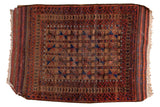 Antique Belouch rug, germinating geometric flower motifs and meandering border. Red, navy, camel.