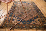 Vintage Dargezine rug with burnt blush Herati field and oversize indigo cloud band spandrels.
