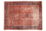 Hand-knotted vintage Persian Mahal carpet, ruby red floral field, sapphire blue border.