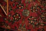 Hand-knotted Persian Lilihan rug's cherry red field with blue, beige, ivory floral palmettes.