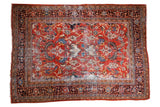 Vintage Persian Mahalati carpet, burnt orange field with blue, yellow floral palmettes.