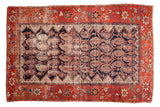 Persian antique Hamadan rug, madder red border, indigo field with visible wear, floral boteh, 4' x 6'2