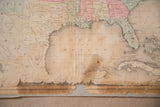 Late 19th century Rand McNally map showing Gulf of Mexico, visible tears and creases.