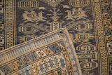 Collector Shirvan rug corner folded to show the hand-knotted foundation, secured edge, and hanging ring.