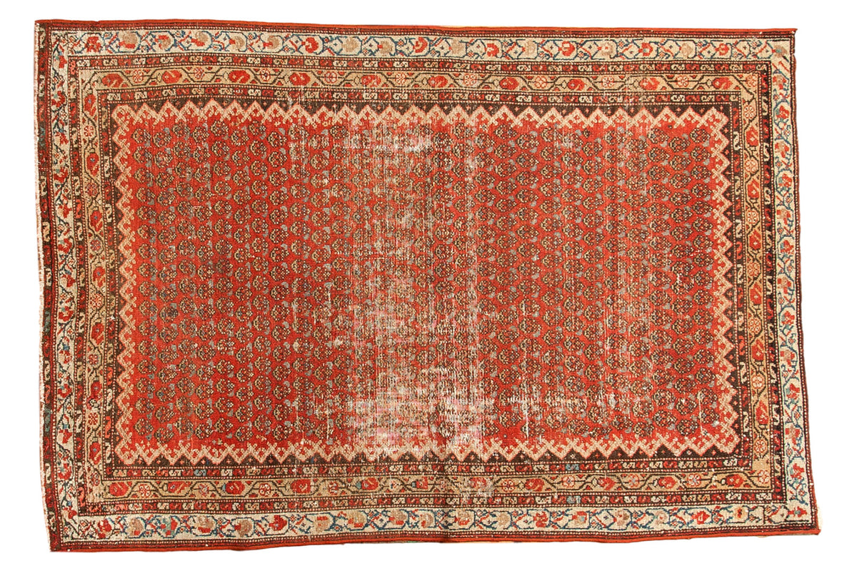 Vintage Hamadan rug, pomegranate red field with allover boteh paisley, visible heavy distress, 4'3" x 6'1".
