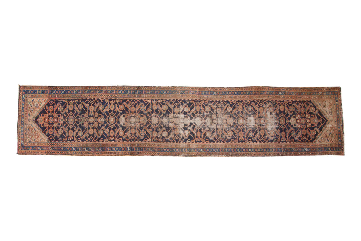 Vintage Hamadan runner, allover geometric Herati pattern on dark navy and terra cotta.