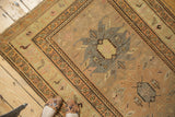 Runner's geometric border with birds, pale gold, and charcoal details.
